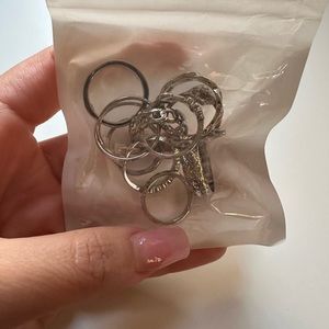 11 sliver rings with different designs